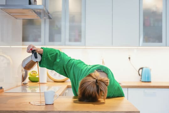 Personne manifestant une grande fatigue