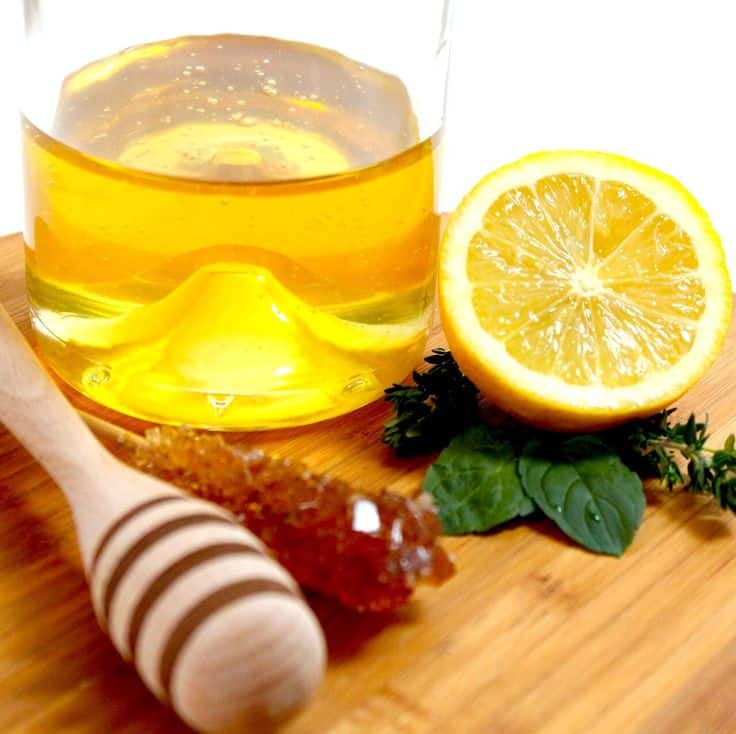 Préparation d'huile d'olive, citron et miel